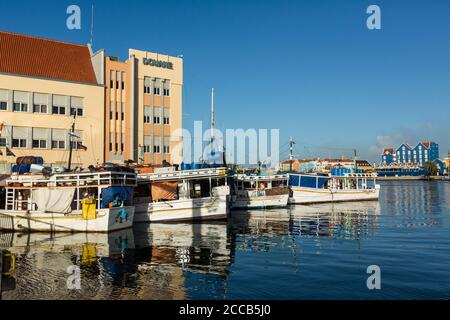 The Floating Market or Drijvende Markt on the Waaigat in the Punda section of Willemstad, the capital of the Caribbean island of Curacao in the Nether Stock Photo