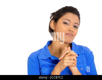 Closeup portrait of sneaky, evil, sly, scheming young woman trying to plot, plan something, screw, hurt someone, isolated on white background. Negativ Stock Photo