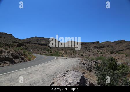 Curved roads and open desert landscape on old Route 66 in Arizona Stock Photo