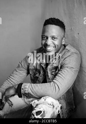 african stock photo of black gentlemen in smart clothes in studio setting Stock Photo