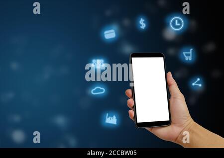 Hand holding smartphone with icons concept. Hand use smartphone online shopping Social network concept.Network Communications, E-Commerce business. Stock Photo