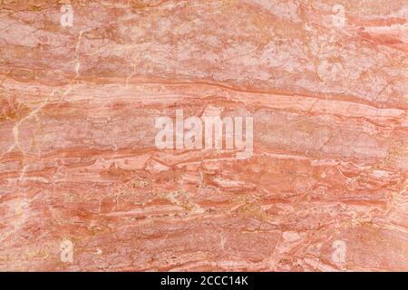 Natural marble background in ged, pink, skarlet tone. Stock Photo