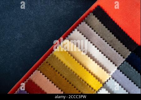 Abstract top down view of colorful velvet samples in warm tones with copy space Stock Photo