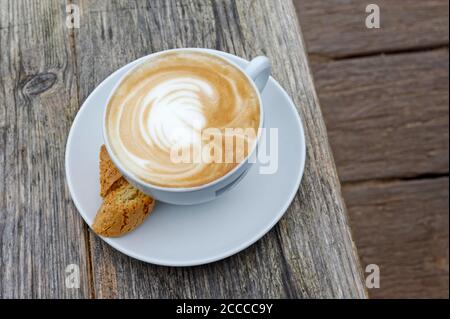 FLAT WHITE COFFEE OUTSIDE Stock Photo