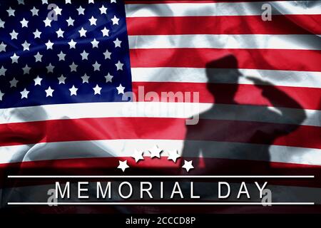 Happy Memorial Day greeting card, National american holiday. Memorial day background remember and honor , shadow of soldier on american flag with word Stock Photo