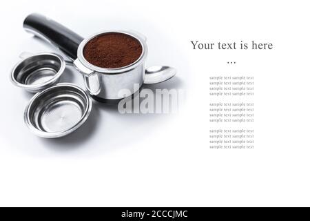 Espresso holder and replaceable coffee filters. The horn from the coffee machine on a white background. Selective focus. High quality photo Stock Photo