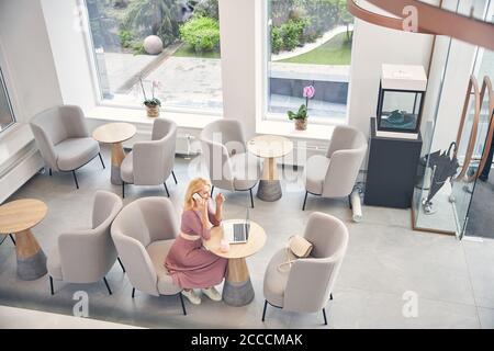 Top view of business lady which being in cafe Stock Photo