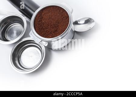 Espresso holder and replaceable coffee filters. The horn from the coffee machine on a white background. Selective focus. High quality photo Stock Photo
