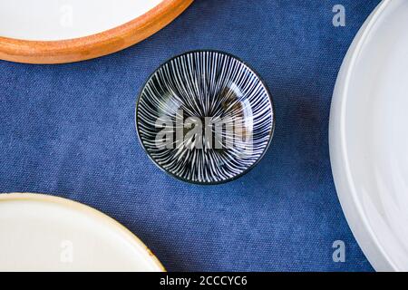 Empty bowls and plates on the table, dishware and tableware, studio shoot Stock Photo