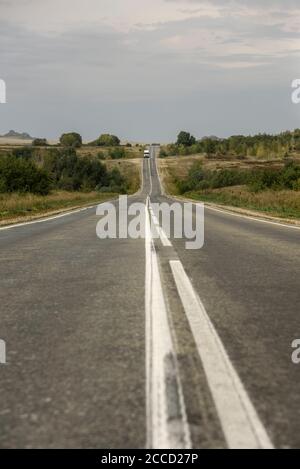 Double solid line on a country road Stock Photo