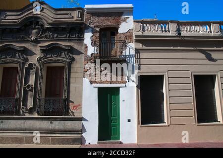 BUENOS AIRES, ARGENTINA - Sep 30, 2014: Casa Minima (The Minimal House), the narrowest house in Argentina, located in San Telmo, one of the oldest dis Stock Photo