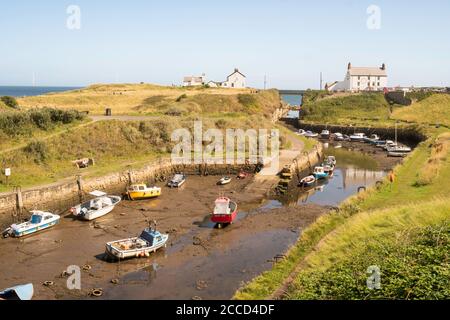 Boats moored within the harbour at Seaton Sluice, Northumberland, England, UK Stock Photo