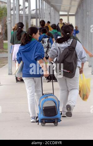 Donna, TX  March 1, 2007: Students head home after the last class of the day at IDEA Public School, a seven-year old charter school with 1,200 mostly Hispanic students in south Texas. ©Bob Daemmrich Stock Photo