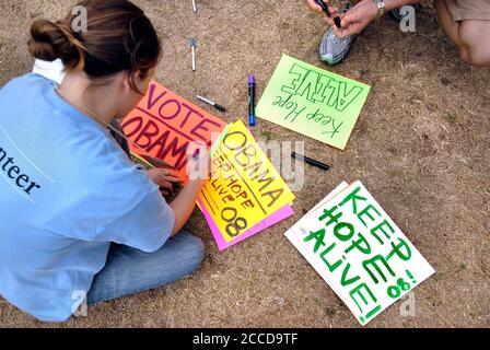 Austin, Texas USA,  February 23, 2007: College students making signs at a campaign rally for U.S. Senator Barack Obama (D-Illinois) , his second major rally after announcing his candidacy for President of the United States last month. Obama spoke through a slight drizzle to a crowd of about 17,000 at  Auditorium Shores on Town Lake. ©Bob Daemmrich Stock Photo