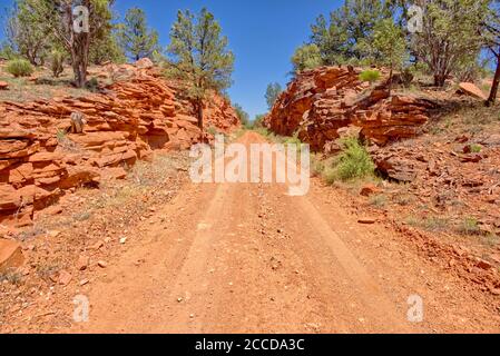 Bullock Road in Arizona with a one lane section through a mini-canyon on the way to Ash Fork. Stock Photo