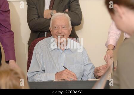 Austin, TX December 14, 2006: Former U.S. President Jimmy Carter signs one copy of his latest book, 'Palestine Peace Not Apartheid' at a local bookstore where hundreds waited in line for a signed copy Friday morning. Carter signed over 1,200 copies of the book in two hours. ©Bob Daemmrich