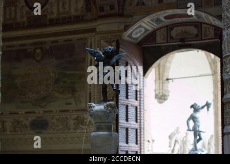 Angel of the Verrocchio fountain inside the courtyard of the Palazzo Vecchio Stock Photo