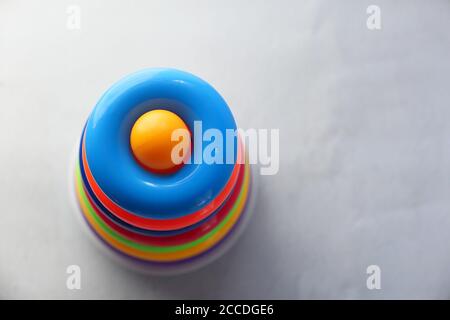 Baby toys on white background. Child development concept. Stock Photo