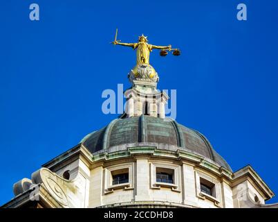 Scales of Justice of the Central Criminal Court fondly known as the Old Bailey London, England, UK which which is a popular travel destination tourist Stock Photo