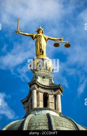 Scales of Justice of the Central Criminal Court fondly known as the Old Bailey London, England, UK which which is a popular travel destination tourist Stock Photo