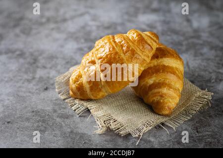 Tasty croissants on table Stock Photo