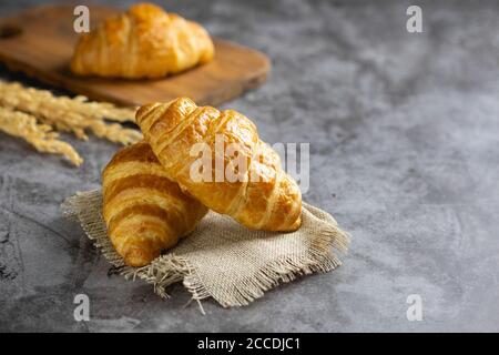 Tasty croissants on table Stock Photo