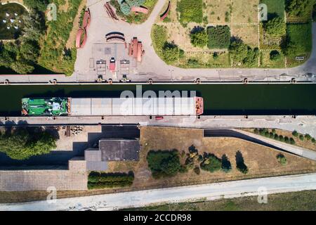 Ship is passing through Gatun Locks, part of Panama Canal. Stock Photo