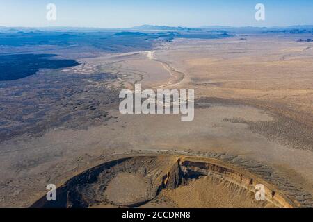 Aerial view of the maar-type volcanic crater, cater Cerro Colorado in the mountains of the El Pinacate Biosphere Reserve and the great Altar desert in Sonora, Mexico. Heritage of humanity by unesco. Typical desert ecosystem in Arizona just a few miles from the site. The volcano is the second largest in an extensive chain of volcanic cones and craters. This crater is distinguished from the others by its reddish color and its formation with clay material  (Photo by Luis Gutierrez / Norte Photo)  Vista aerea del cráter volcánico tipo maar, cater Cerro Colorado en la sierra de la Reserva de la Bio Stock Photo