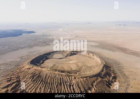 Aerial view of the maar-type volcanic crater, cater Cerro Colorado in the mountains of the El Pinacate Biosphere Reserve and the great Altar desert in Sonora, Mexico. Heritage of humanity by unesco. Typical desert ecosystem in Arizona just a few miles from the site. The volcano is the second largest in an extensive chain of volcanic cones and craters. This crater is distinguished from the others by its reddish color and its formation with clay material  (Photo by Luis Gutierrez / Norte Photo)  Vista aerea del cráter volcánico tipo maar, cater Cerro Colorado en la sierra de la Reserva de la Bio Stock Photo