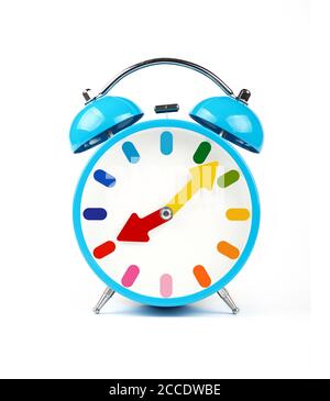 Close up one blue retro alarm clock with twin metal bells isolated on white background, low angle front view Stock Photo