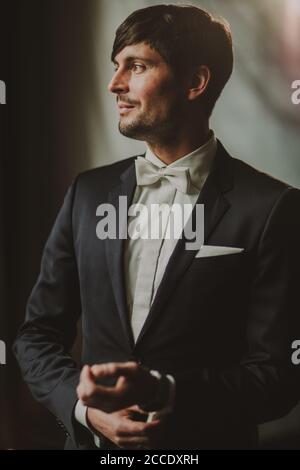 Man, festively dressed, suit, bow tie, Stock Photo