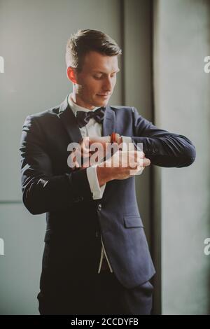 Man, festively dressed, suit, bow tie, Stock Photo