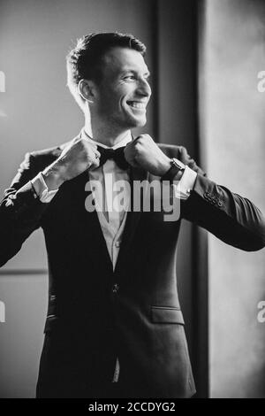 Man, festively dressed, suit, bow tie, Stock Photo