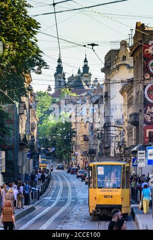 Lviv (Lwiw, Lemberg), Doroshenka street, streetcar, Church of St. Mary Magdalene, today Organ Hall in Lviv Oblast, Ukraine Stock Photo