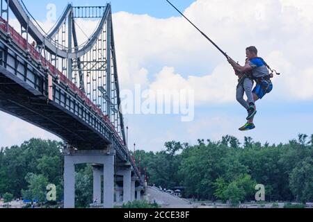 Kiev (Kyiv), bungee jumping, river Dnipro (Dnieper), Parkovy (Pedestrian) Bridge to Trukhaniv Island in Kyiv, Ukraine Stock Photo