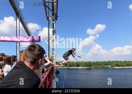 Kiev (Kyiv), bungee jumping, river Dnipro (Dnieper), Parkovy (Pedestrian) Bridge to Trukhaniv Island in Kyiv, Ukraine Stock Photo