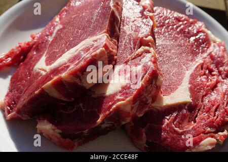 Raw Meat Steaks Stock Photo