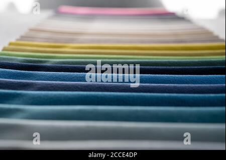 Gradient colored luxury velvet samples folded in rows Stock Photo