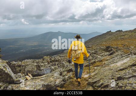 man going to meet his dream, dreams come true. back view photo Stock Photo