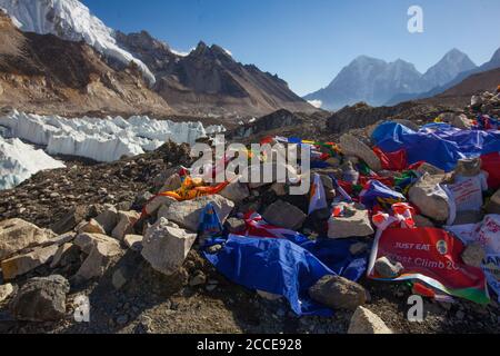 EVEREST BASE CAMP, NEPAL, 20 October 2018 - View from Mount Everest base camp, tents and prayer flags. A lot of tourists on a popular treck.  Sagarmat Stock Photo