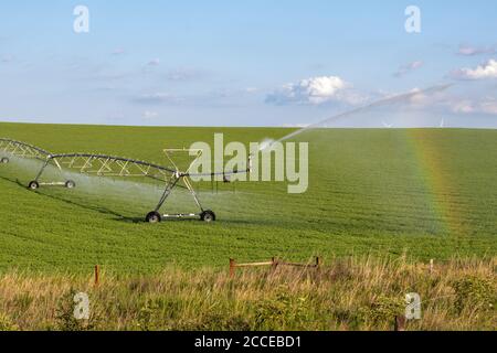 July 22, 2019 Nebraska Farm fields Near O'Nell Nebraska.Pivot running in field with rainbow on sunny day . High quality photo. High quality photo Stock Photo