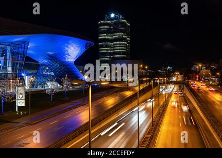Europe, Germany, Bavaria, Munich, city center, Georg-Brauchle-Ring, view of the BMW Welt and the BMW headquarters in Munich at night Stock Photo