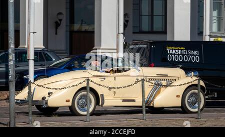 Auburn Speedster replica vintage car driving on streets of Helsinki. Original cars were manufactured in early 20th century and are really rare. Stock Photo