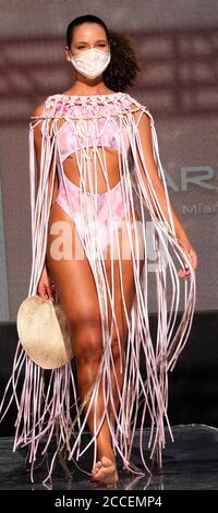 Miami Beach, United States. 20th Aug, 2020. A model walks the runway wearing a swimsuit by designers from Upcycle Challenger fashions during the Paraiso Miami Beach fashion show at the SLS hotel in Miami Beach, Florida, on Thursday, August 20, 2020. The Upcycle Challenge is devoted to young talent designers from Florida International University. The national competition invites design students to create two pieces from donated dead-stock fabrics, for the opportunity to present at PARAISO, and win designer mentorships. Photo by Gary I Rothstein/UPI Credit: UPI/Alamy Live News Stock Photo