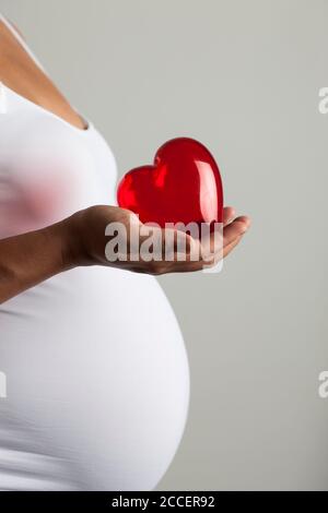 Maternal love, conceptual image Stock Photo