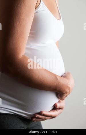 Pregnant woman in pain Stock Photo