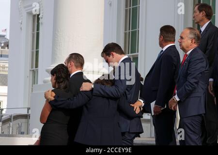 Arlington, United States Of America. 21st Aug, 2020. Trump family and friends as pallbearers load the casket of Robert Trump after a service at the White House in Washington, DC on Friday, August 21, 2020. Credit: Tasos Katopodis/Pool via CNP | usage worldwide Credit: dpa/Alamy Live News Stock Photo