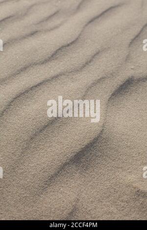 Patterns in the sand on the beach Stock Photo