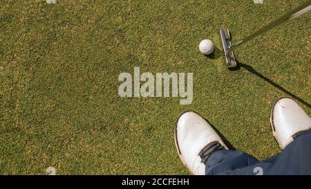 A person playing golf. High quality photo Stock Photo