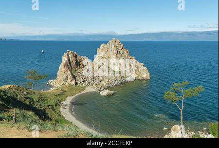 Beautiful landscape of Siberian Baikal Lake. Panoramic view of Shamanka Rock on Olkhon. Cape Burhan. concept of travel. Stock Photo